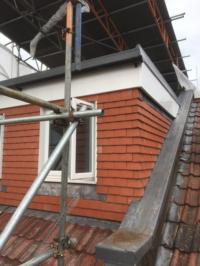 Dormer with tile cladding on a Bristol terrace
