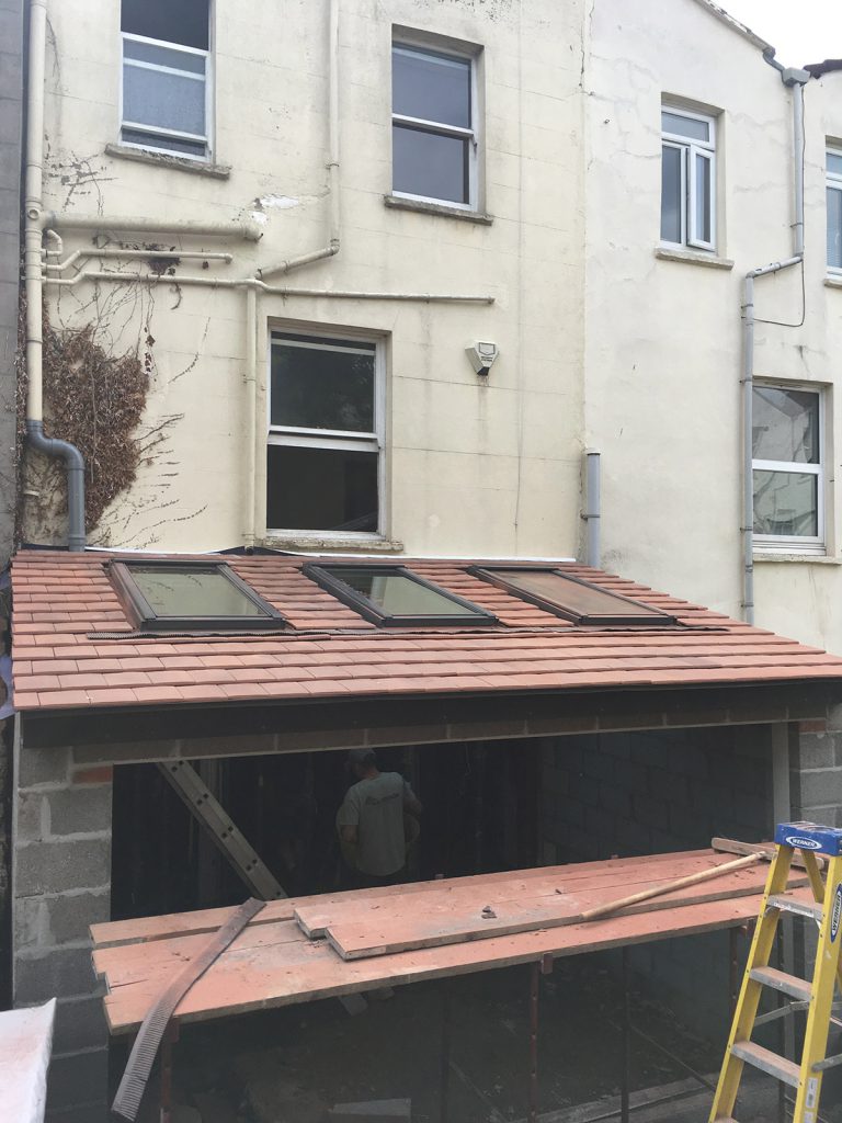 Lean-to extension with Velux windows in Easton, Bristol