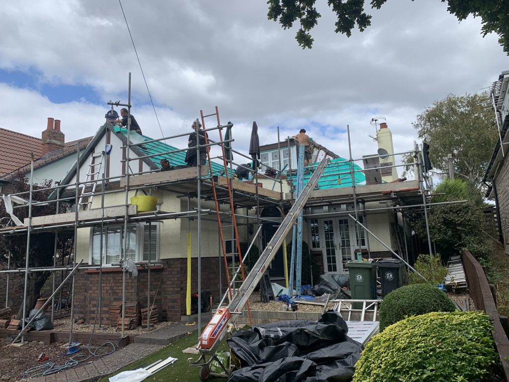 Re-roof in progress with team on scaffold, Brislington, Albion Roofing.