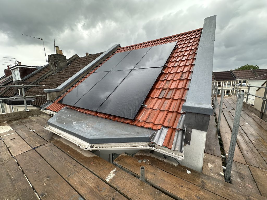 Solar panels on a new clay tiled roof, Bristol, Albion Roofing.