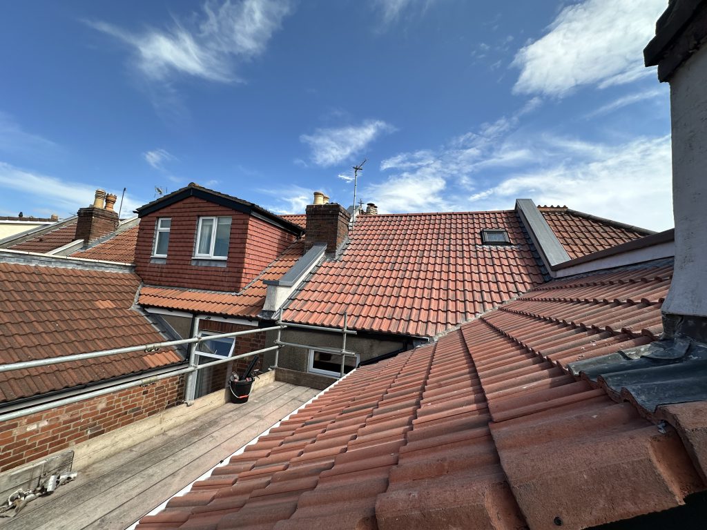 Terrace roofs with dormer and Velux, Bristol, Albion Roofing.